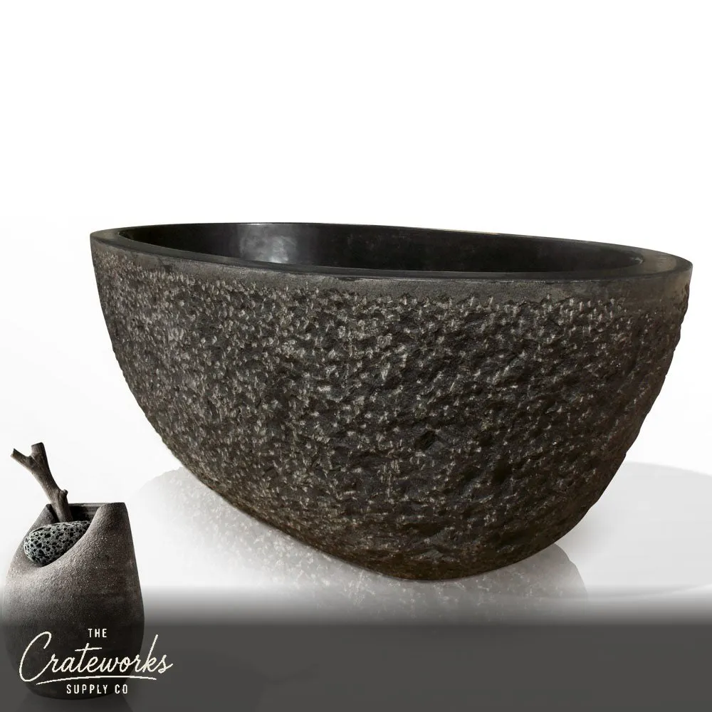 Granite bathtub polished interiors and rims with a chiseled exterior