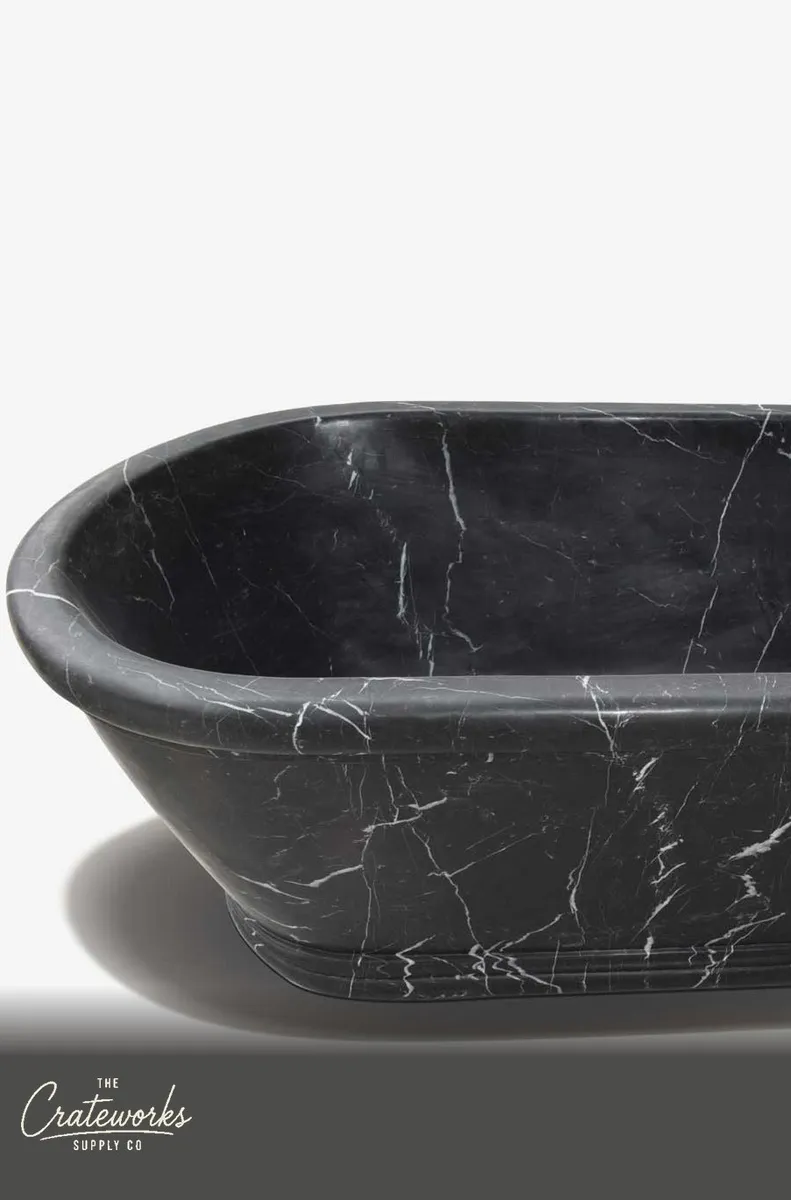 Freestanding black marble bath, detail 1