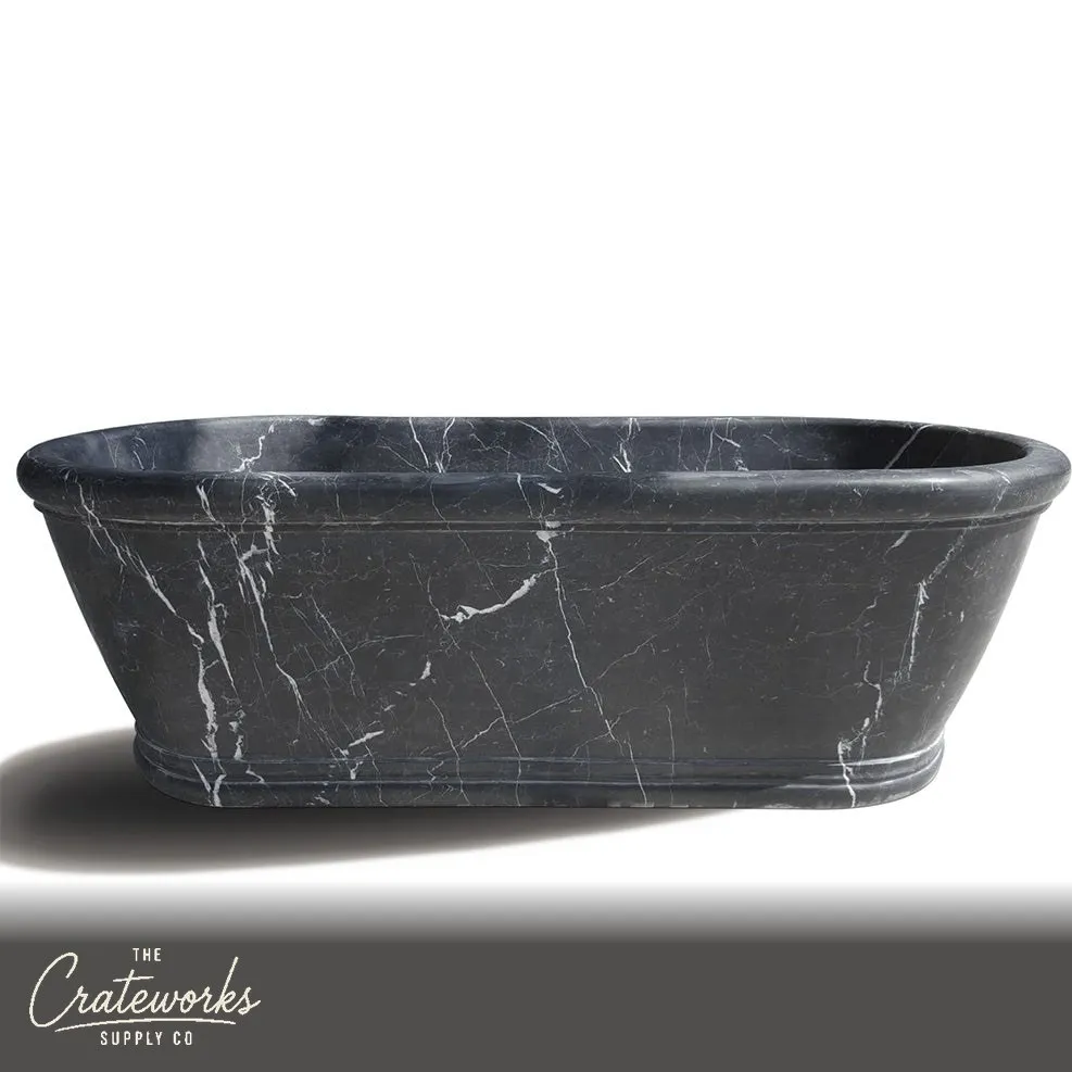 Freestanding black marble bath