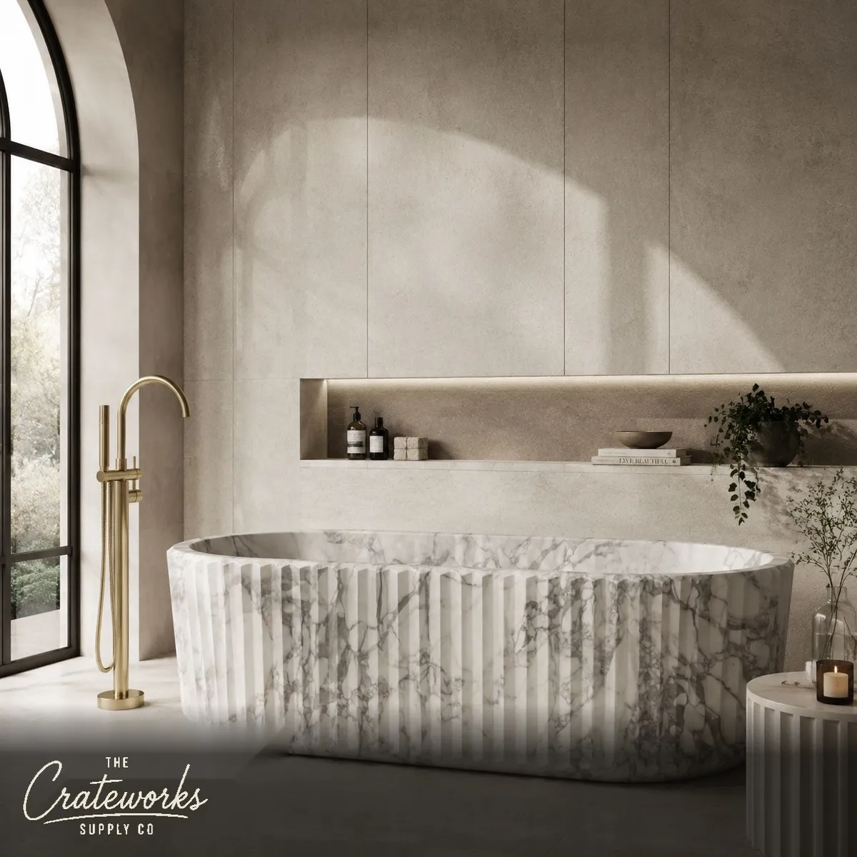 Freestanding marble tub in Fluted Calacatta Marble