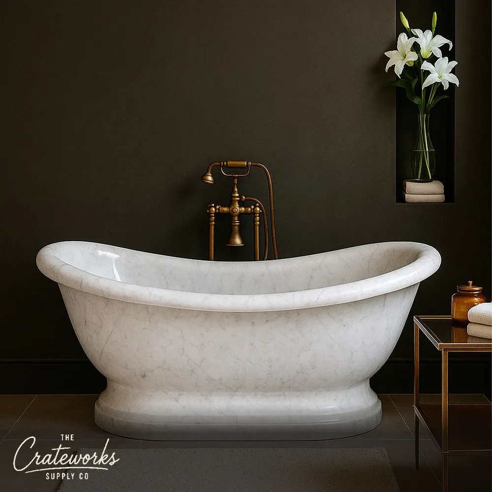 stone bathtub with marble pedestal