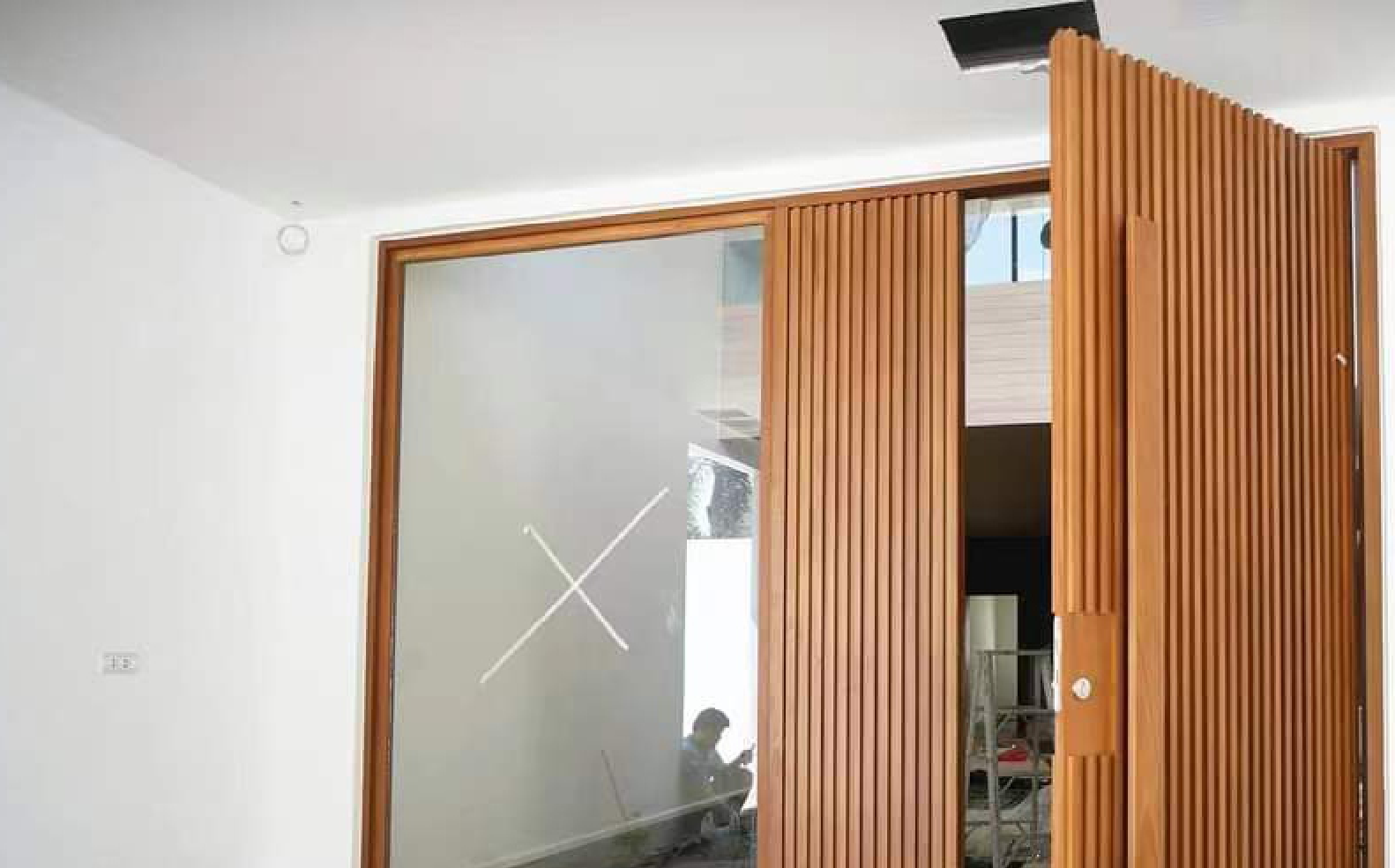 Wood Pivot Entry Door with Glass Insert