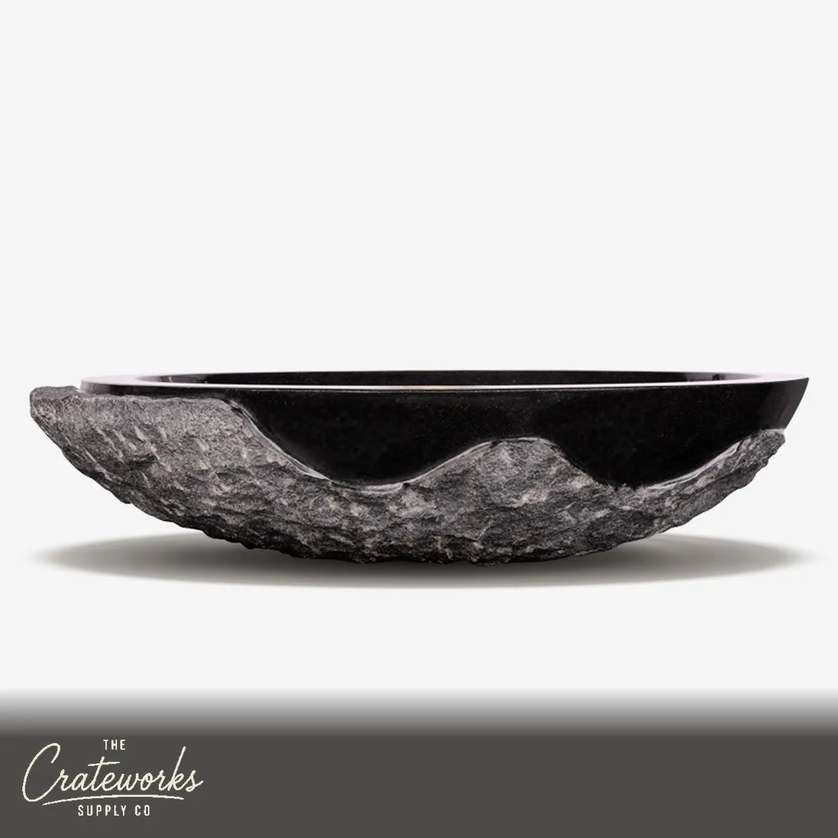 Stone basin chiseled outside