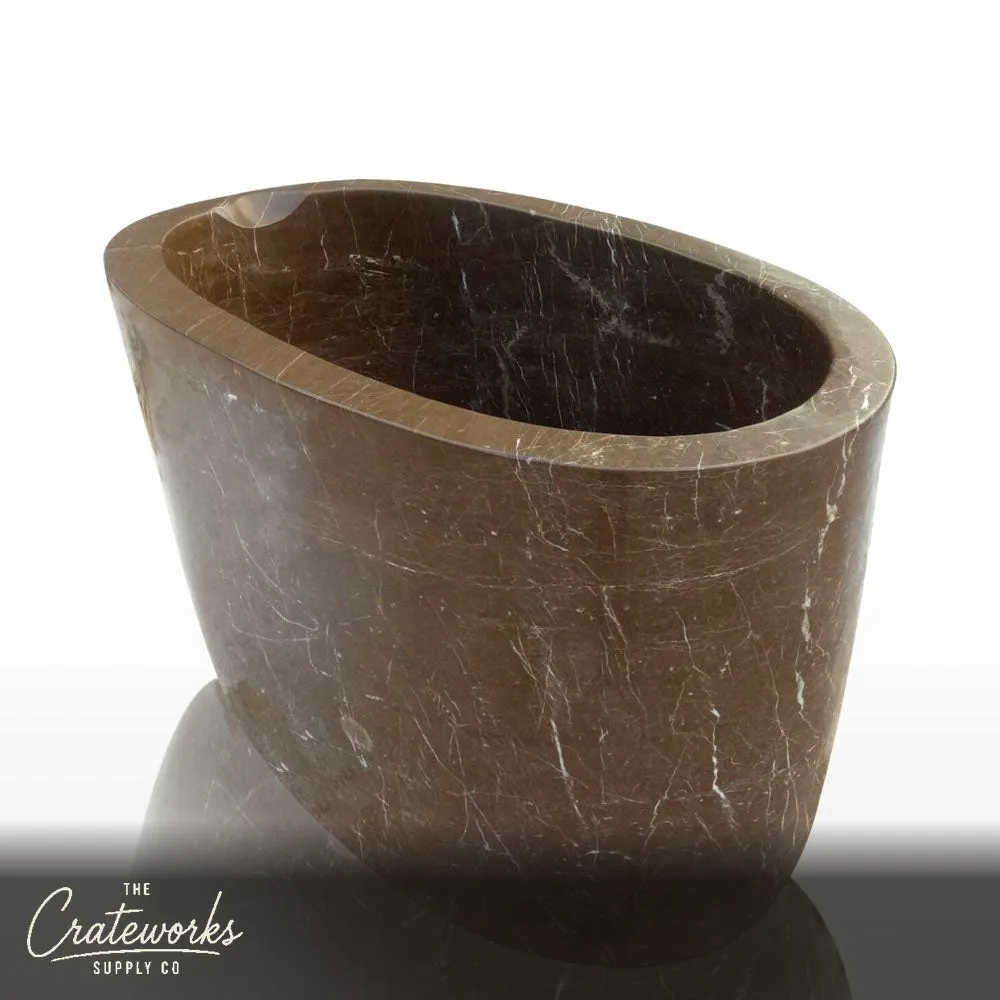 Deep japanese soaking tub with head rester hand-carved from brown marble