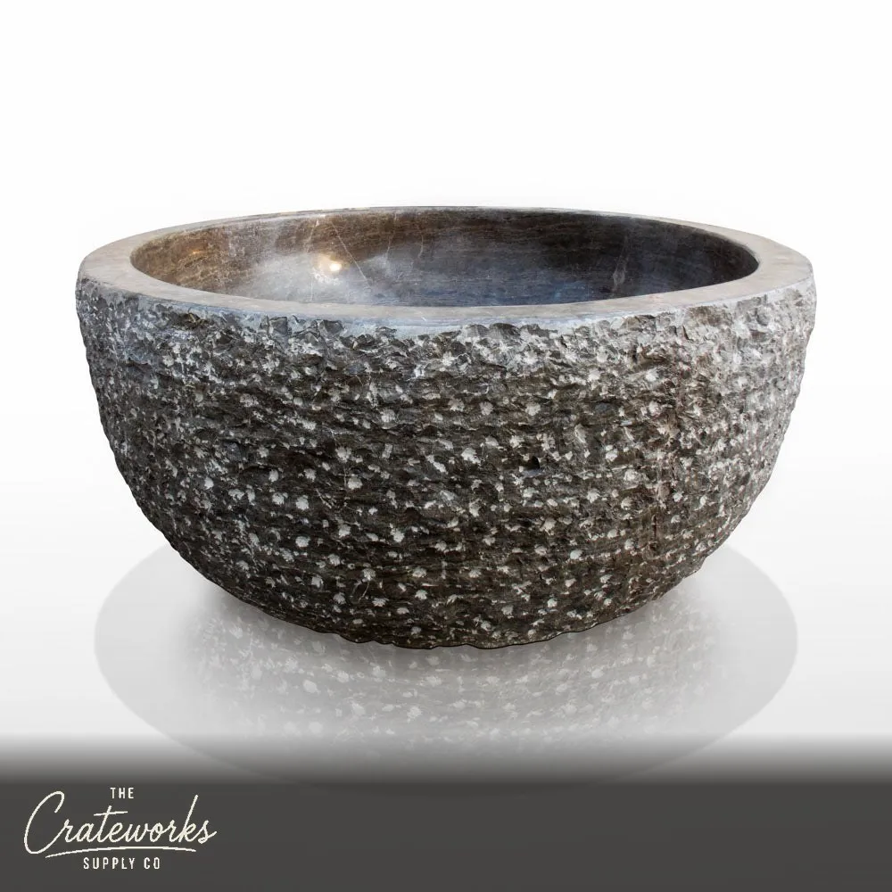 Round tub hand-carved from brown marble Japanese soaking tub style