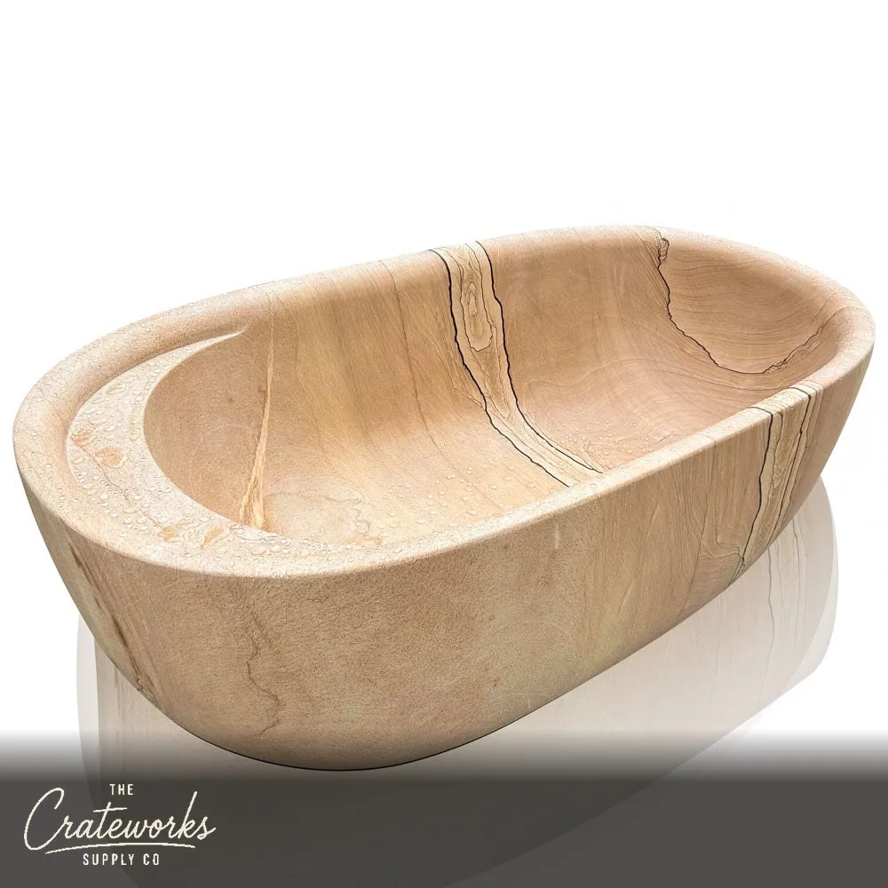 Customized stone bathtub hand-carved from sandstone with head rester and wine holder